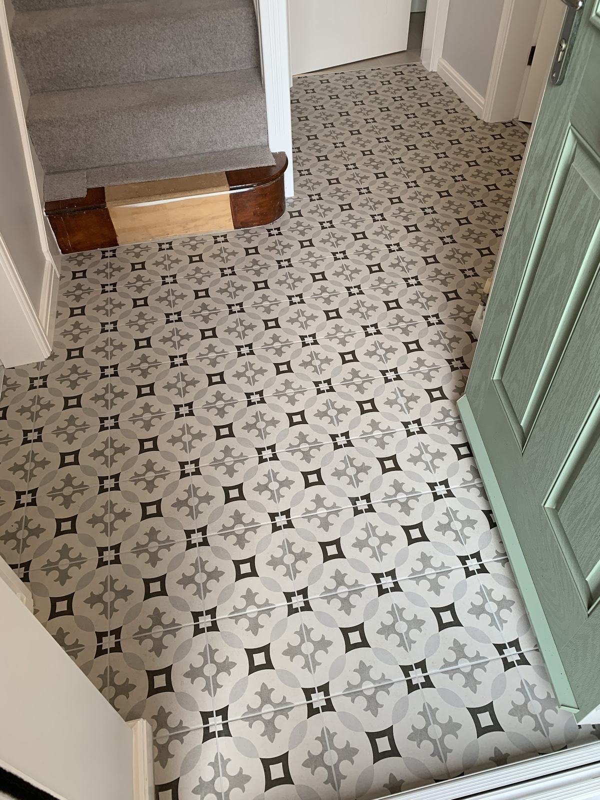 Tim's patterned hallway floor by the stairs